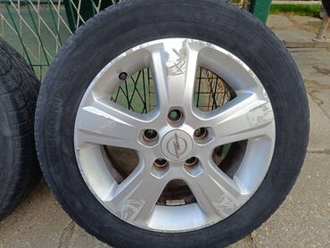 Gume i felne: Alu felne Opel Meriva 15 raspon rupa 5X110mm,centralna rupa — 11