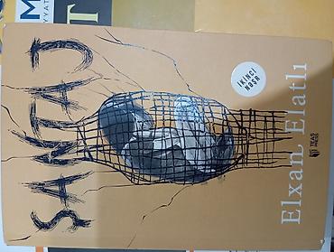 dərs kitabları: Məhsul: Kitab – “Santaj” - Müəllif: Elxan Elatlının adı üz qabığında — 1