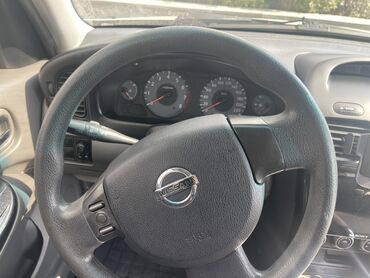 Nissan: Nissan Sunny sedan Bu nömrəyə WhatsApp vasitəsilə yaza bilərsiniz — 9