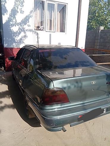эшик б у: Daewoo Nexia: 1994 г., 1.5 л, Кол менен иштөөчү, Бензин, Седан — 3