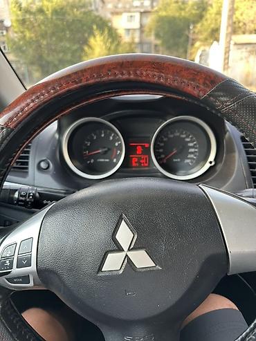 lancer: Mitsubishi Lancer: 2010 г., 1.5 л, Автомат, Бензин, Седан — 7