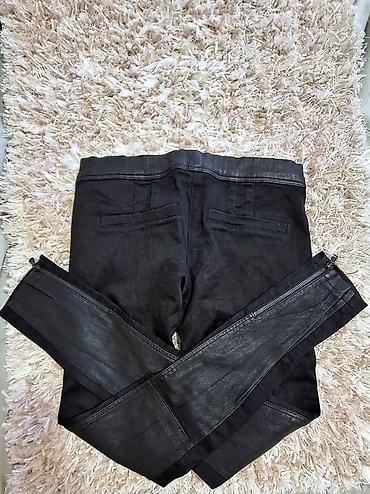 Pantalone: Ženske crne uske pantalone Dolce Gabbana sa kožnim efektom. - — 9