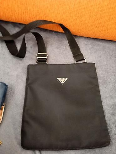 Putni koferi i torbe: Set torbi i tašni – više modela - Elegantna crna tašnica sa metalnim — 31