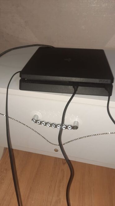 JMC: PlayStation 4 Slim oyun konsolu və yarış simulyatoru aksesuarları