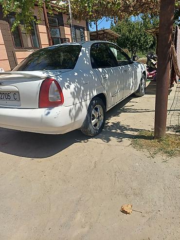 седло на даф: Daewoo Nubira: 1997 г., Механика, Седан — 2