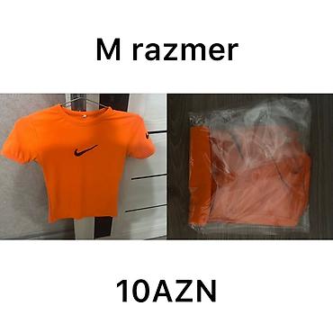 idman sortiki: Narıncı rəngli qısaqol köynək. - Ölçü: M - Ön hissədə qara nişanlı — 1
