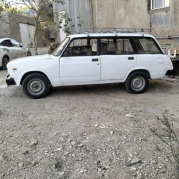 2104 baqaj: Lada 2104 universal, ağ rəng. - Kuzov: 5 qapılı universal gövdə, iri — 3