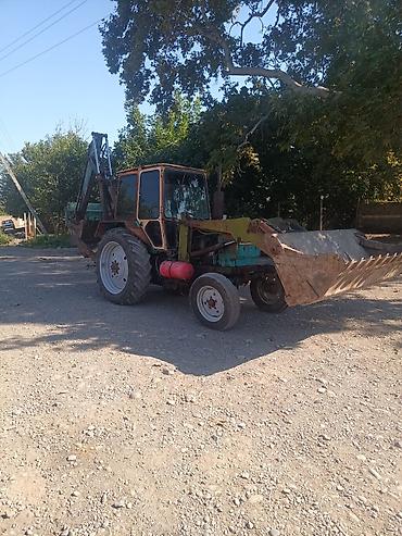 Kommersiya nəqliyyat vasitələri: Ekskavator-yükləyici traktor - Ön hissədə iri yükləmə kovası, arxa — 5