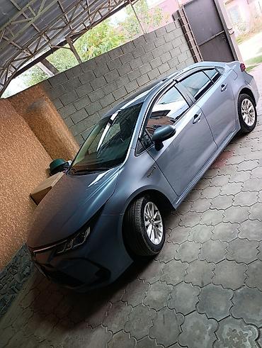 полики королла: Toyota Corolla: 2023 г., 1.8 л, Автомат, Гибрид, Седан — 1