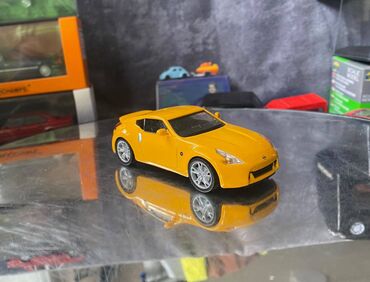 Avtomobil modelləri: Коллекционная модель Nissan 370Z Z34 yellow 2008 DeAgostini Scale — 4
