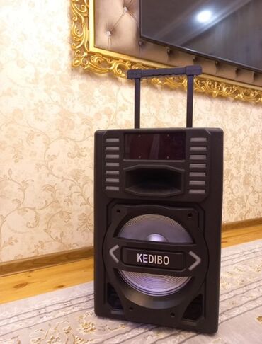 ses guclendiriciler: KEDIBO firmasının qara rəngdə, daşına bilən dinamik sistemi. Bluetooth
