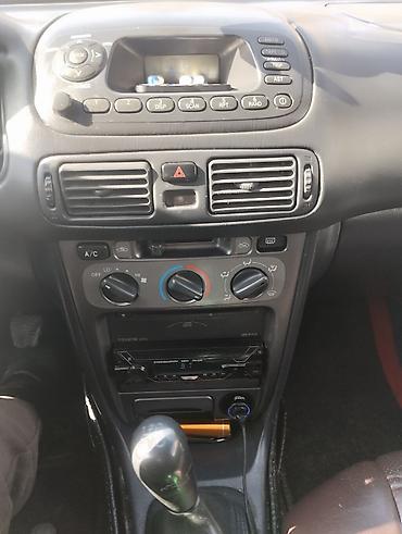 Toyota: Toyota Corolla: 2001 г., 1.4 л, Механика, Бензин, Хэтчбэк — 2