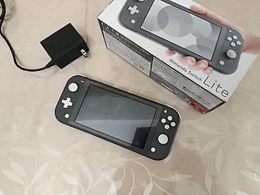 nintendo lite: Nintendo Switch Lite yeni kimi vəziyyətdədir və çox səliqəli istifadə — 1