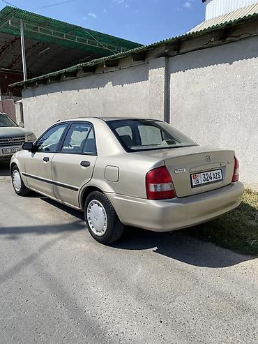 mazda 2004: Mazda 323: 2003 г., Автомат, Бензин, Седан — 6