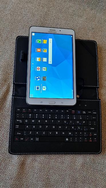 Tableti: Samsung Galaxy Tab 4 7.0 sa futrolom i mini tastaturom - Model — 8