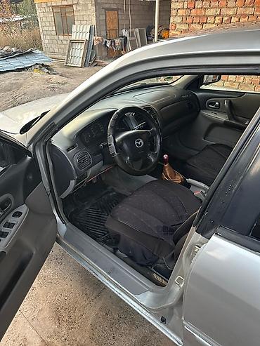mazda 323 2003: Mazda 323: 2003 г., 1.6 л, Механика, Бензин, Хэтчбэк — 5