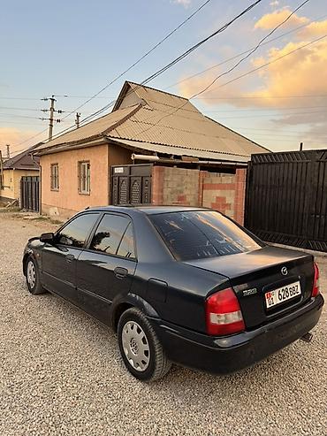 Mazda 323: 1999 г., 1.6 л, Механика, Бензин, Седан