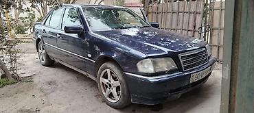 w202 baqaj: Mercedes-Benz C‑Class sedan (W202), tünd mavi rəng. - Kuzov: 4 qapılı — 3