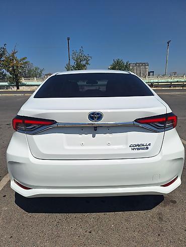 corola: Toyota Corolla: 2023 г., 1.8 л, Вариатор, Гибрид, Седан — 7