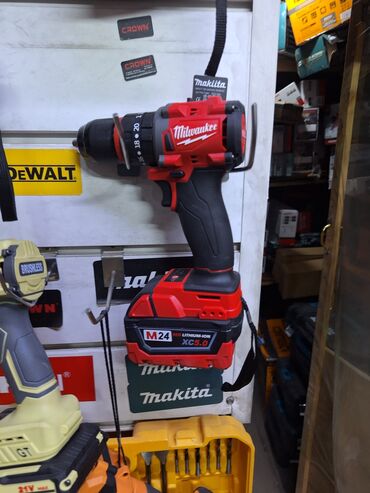распылитель краски: Ударная дрель-шуруповерт Milwaukee M24 с компактным корпусом красного