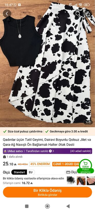 i̇dman qadın ətəkləri: Dairəvi boyunlu, qolsuz qara jilet və qara-ağ naxışlı, ön bağlamalı