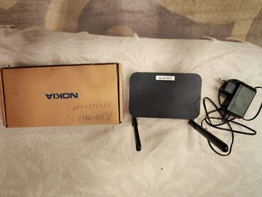 şur mikrafonlar: Nokia Wi‑Fi/GPON router Xüsusiyyətlər: - İki ədəd çıxarıla bilən