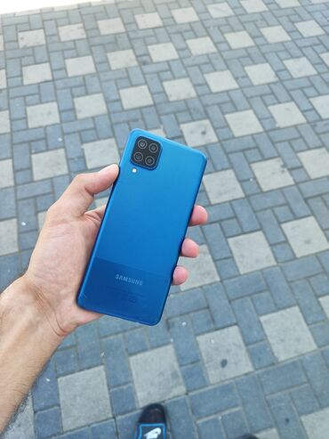 кинотеатр самсунг: Samsung Galaxy A12, 64 ГБ, цвет - Синий, Кнопочный, Отпечаток пальца, Face ID