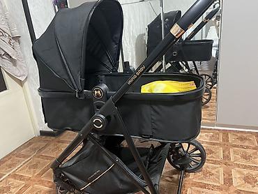 штаны кожаные: Коляска-люлька Innig Baby, цвет черный. Основные особенности: - — 1