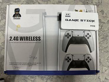 консоль игровая: Game Stick Pro 4K Ultra HD — компактная ретро-приставка в формате — 4