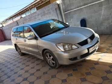 разбор паджеро 3: Mitsubishi Lancer Wagon (универсал), серебристый цвет кузова. Кузов и