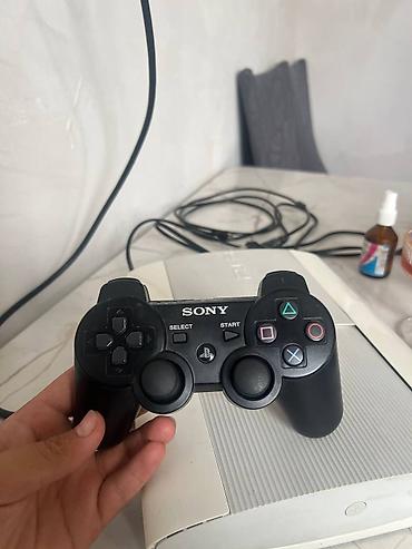 PS3 (Sony PlayStation 3): PlayStation 3 Super Slim (белая) Комплект: - Консоль PS3 Super Slim — 9