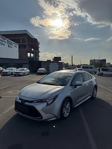 электромот: Toyota Corolla: 2021 г., Гибрид, Седан — 1
