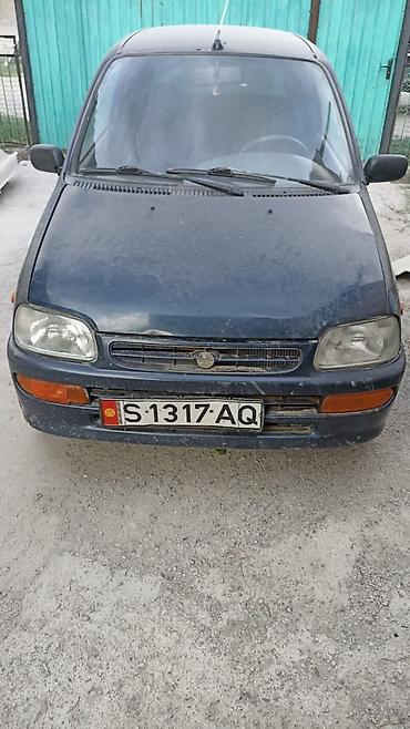 нур мото: Daihatsu Cuore: 1999 г., Механика, Хэтчбэк — 3