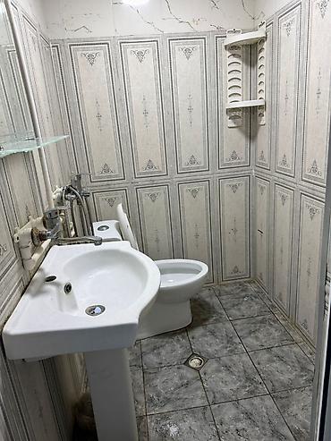 Mənzillər: 1 otaqlı mənzil (studiyaya yaxın plan) – mərkəzi istilik radiatorları — 5