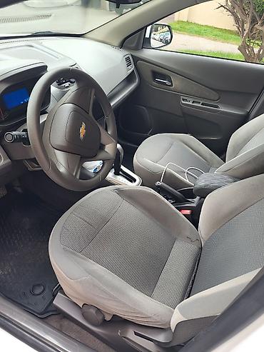 kond: Chevrolet Cobalt sedan – ağ rəng, avtomatik ötürmə Xüsusiyyətlər: - — 4