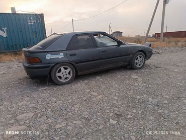 Mazda: Mazda 323: 1991 г., 1.6 л, Механика, Бензин, Хэтчбэк — 13