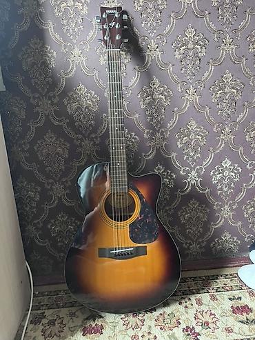 Гитары: Акустическая гитара Yamaha FS (модель на наклейке: FSX/FS-тип, на фото — 1