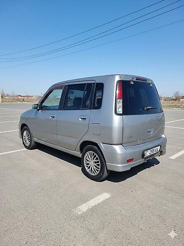 растрочка машина: Nissan Cube: 2000 г., 1.3 л, Автомат, Бензин, Минивэн — 5