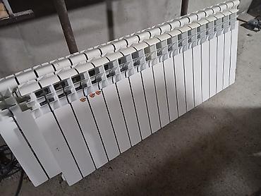 Qızdırıcı və isidicilər: 57 seksiya kombi radiatorları satılır. 1 i 17 seksiyalı .1 i 18 — 5