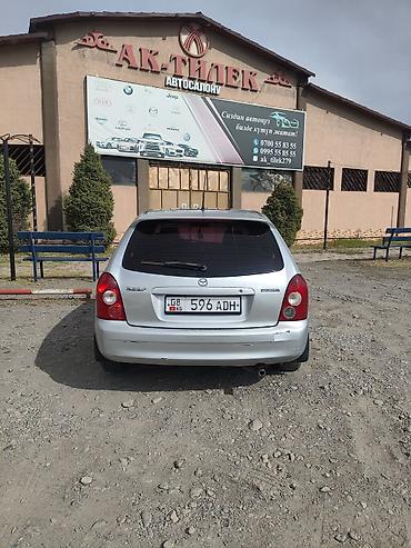 Транспорт: Mazda 323: 2002 г., 1.6 л, Механика, Бензин, Универсал — 4