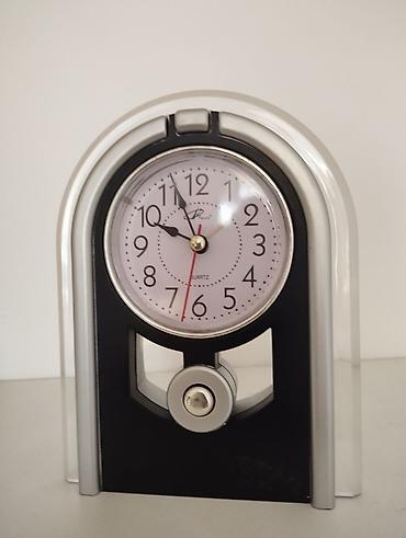 ev saatı: Saat hü 15 sm en 12 sm budilnikidə vat — 6