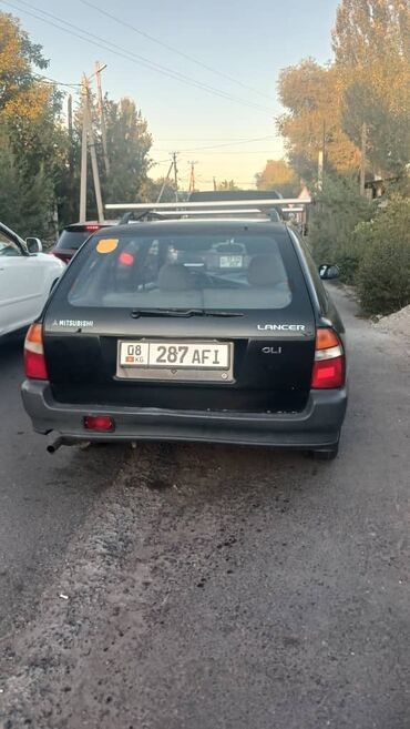 машина mitsubishi: Mitsubishi Lancer: 1994 г., 1.6 л, Механика, Бензин, Универсал