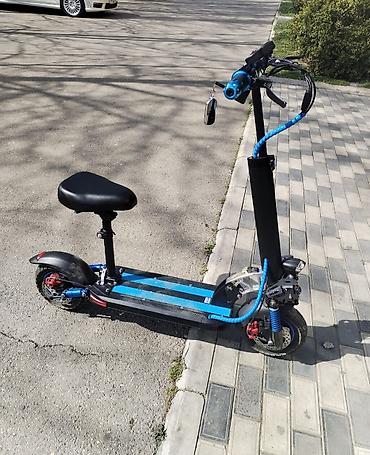 Электротранспорт: Elektrik skuter – oturacaqlı, güclü amortizatorlu model — 1