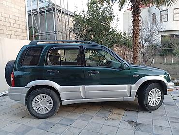Suzuki: Suzuki Grand Vitara: 2.5 л | 1999 г. 260000 км Внедорожник — 5