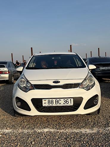 Kia: Kia Rio: 1.4 л | 2012 г. Хэтчбэк — 6