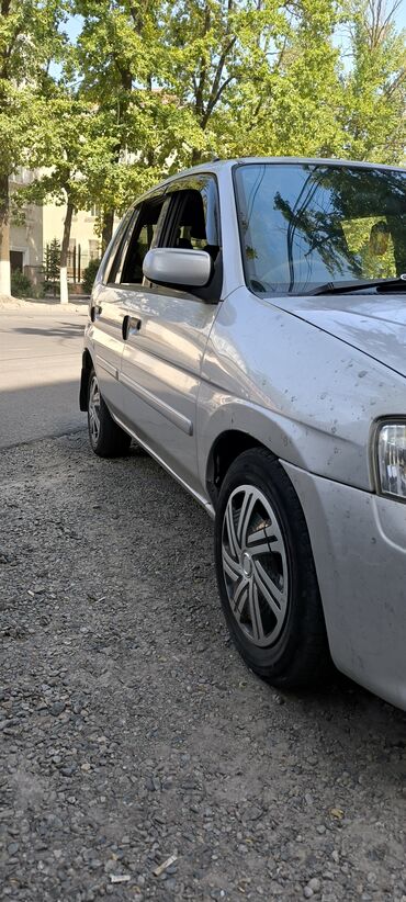 подшивочная машина: Mazda Demio: 2000 г., 1.3 л, Автоматтык, Бензин
