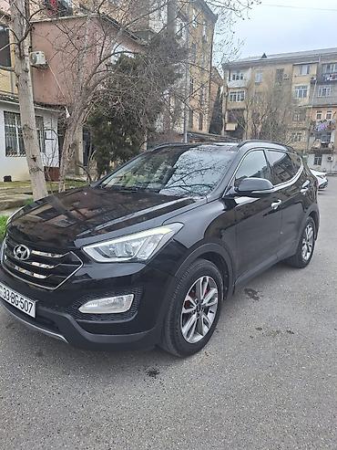 ford focus hatchback: Hyundai Santa Fe: 2 l | 2014 il Krossover — 2