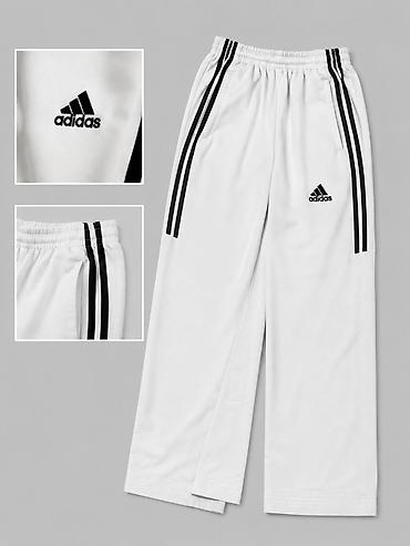 карманные: Белые спортивные брюки adidas с фирменными тремя полосками по бокам — 1