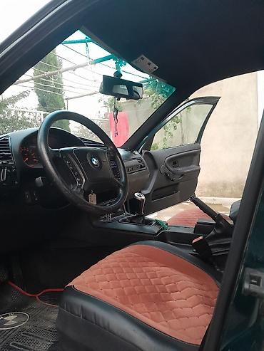 s class fara: BMW sedan, yaşıl-mavi (tünd petrol) rəng. E36 kuzov. - 4 qapı, salon — 7