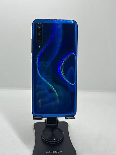 3000 сом телефон: Xiaomi, Mi A3, Б/у, 64 ГБ, цвет - Синий, 2 SIM — 2